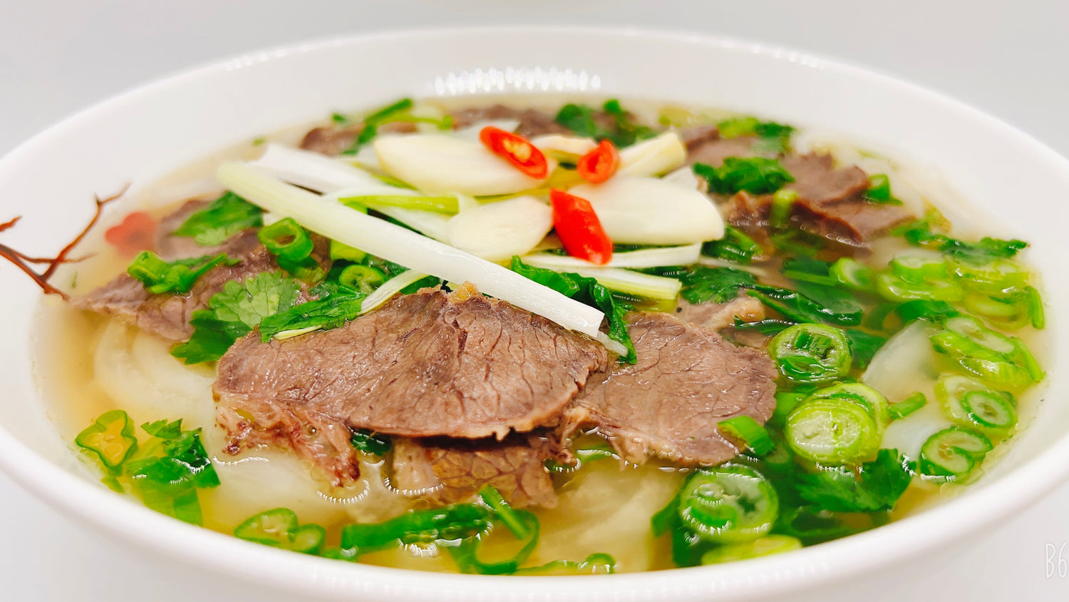 A special and delicious Hanoi Style Beef Pho cooked by T-ZO located in Lorton, Fairfax County, Virginia. This is one of the most famous dishes of Vietnamese Cuisine