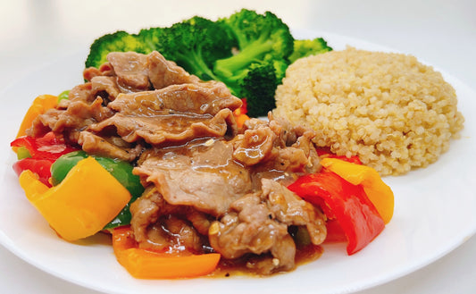 A dish of frying beef coated with T-ZO's special black pepper sauce